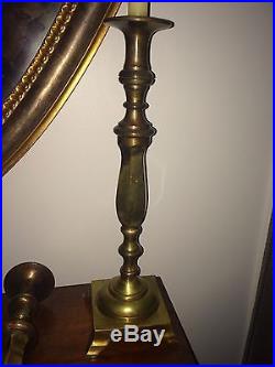A Pair of an Antique Brass Footed Screw Base Candlestick Candle Holders