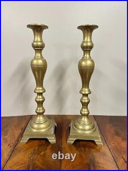 A Set of Large Brass Antique Brass Candlesticks