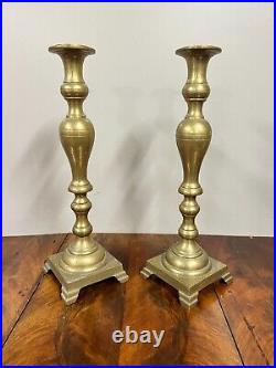 A Set of Large Brass Antique Brass Candlesticks