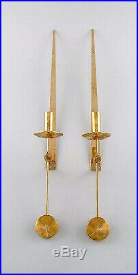 A pair of Skultuna, Sweden, brass candlesticks. Model 1607. Pierre Forsell