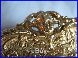 ANTIQUE SOLID BRONZE/BRASS RING FINGER CANDLE HOLDER withPUTTI FACES & GRIFFIN