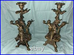 Antique Pair of Heavy Brass Candlesticks Cherubs Holding Doves Excellent Used