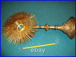 Brass Sun antique standing Vintage has small glass door, is 17 inch tall