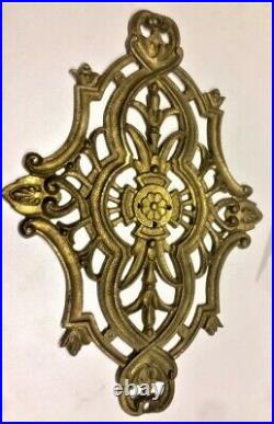 Brass wall mounted, swivel, winged dual dragons / griffins and wall medallion