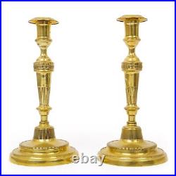 French Directoire Pair of Incised Brass Candlesticks, early 19th century