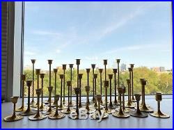 Lot of 38 vintage brass candlesticks from 3 to 9. Wedding, shower