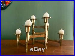 Mid century modern swiveling brass candle holders with vintage juvaha oy candles