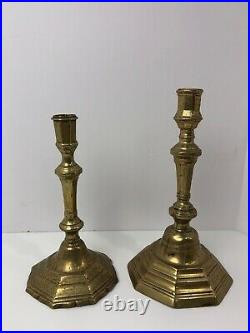 Near pair brass candlesticks octagonal shaped bases Dutch early 18th century