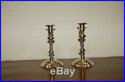 Petal based brass candlesticks George II c. 1745