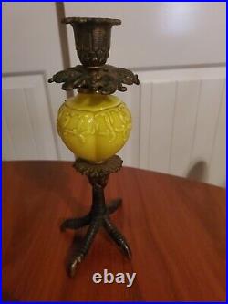 Rare brass tealight candle holder. Yellow glass with chicken foot